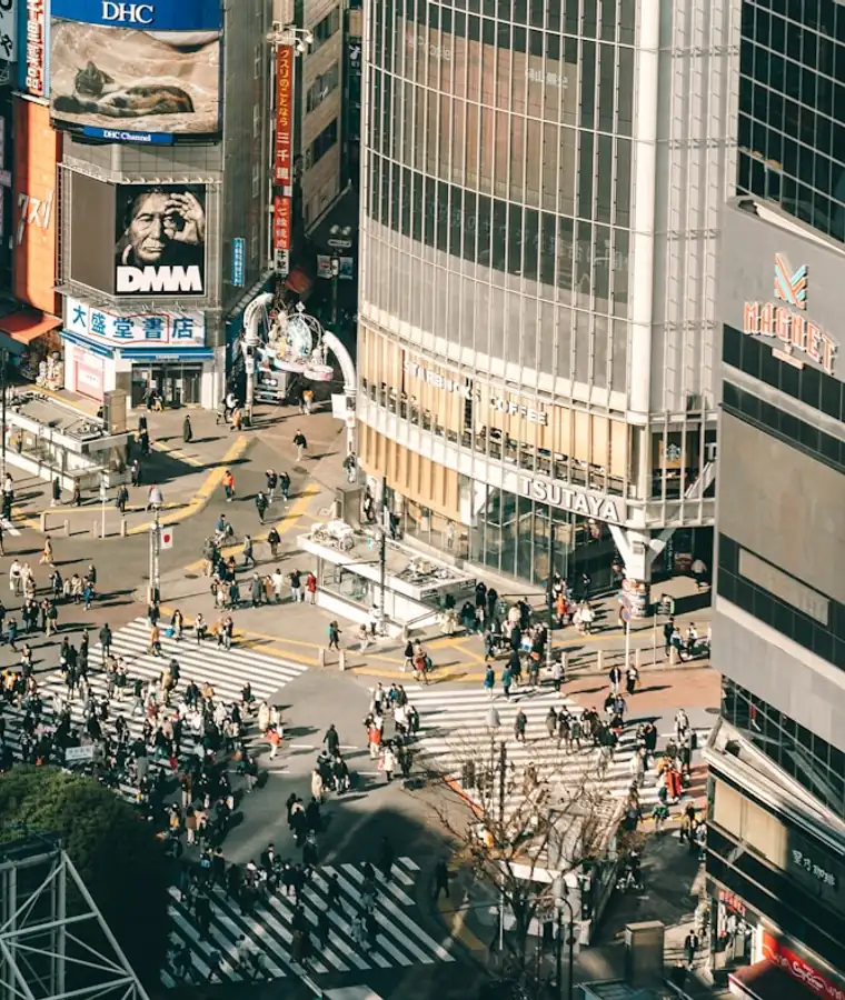 People crossing an intersection in different directions
